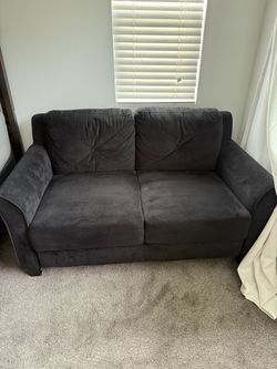 Black velvet loveseat couch
