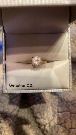 Genuine CZ in 14 karat gold setting