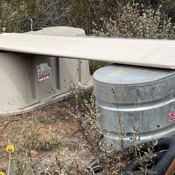 Large, Unused Water Tubs. One Plastic, One Aluminum Coded.