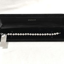 Brand New From Italy (Gianni Bernini) .925 Silver Die-Cut Bead Strand 7-1/2” Bracelet. Retails For $160. I’ll accept $85.