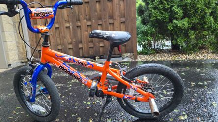 16" inch mongoose bike - orange and black; in excellent condition