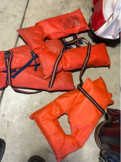 Three life jackets