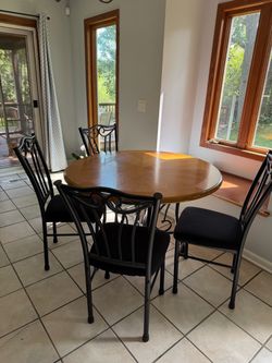 Wooden dining table with 4 chairs