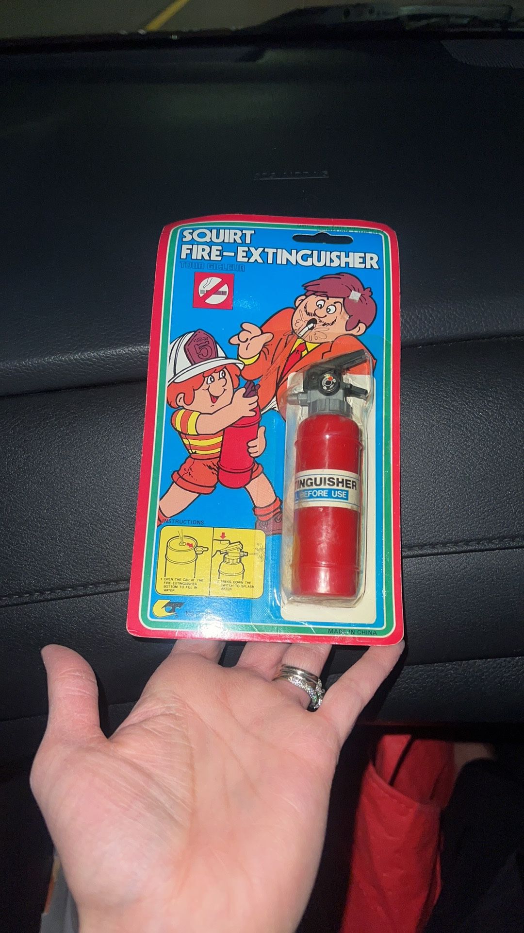 VINTAGE, ORIGINAL - SQUIRT FIRE-EXTINGUSHER TOY, MADE IN HONG KONG. Corners are bent