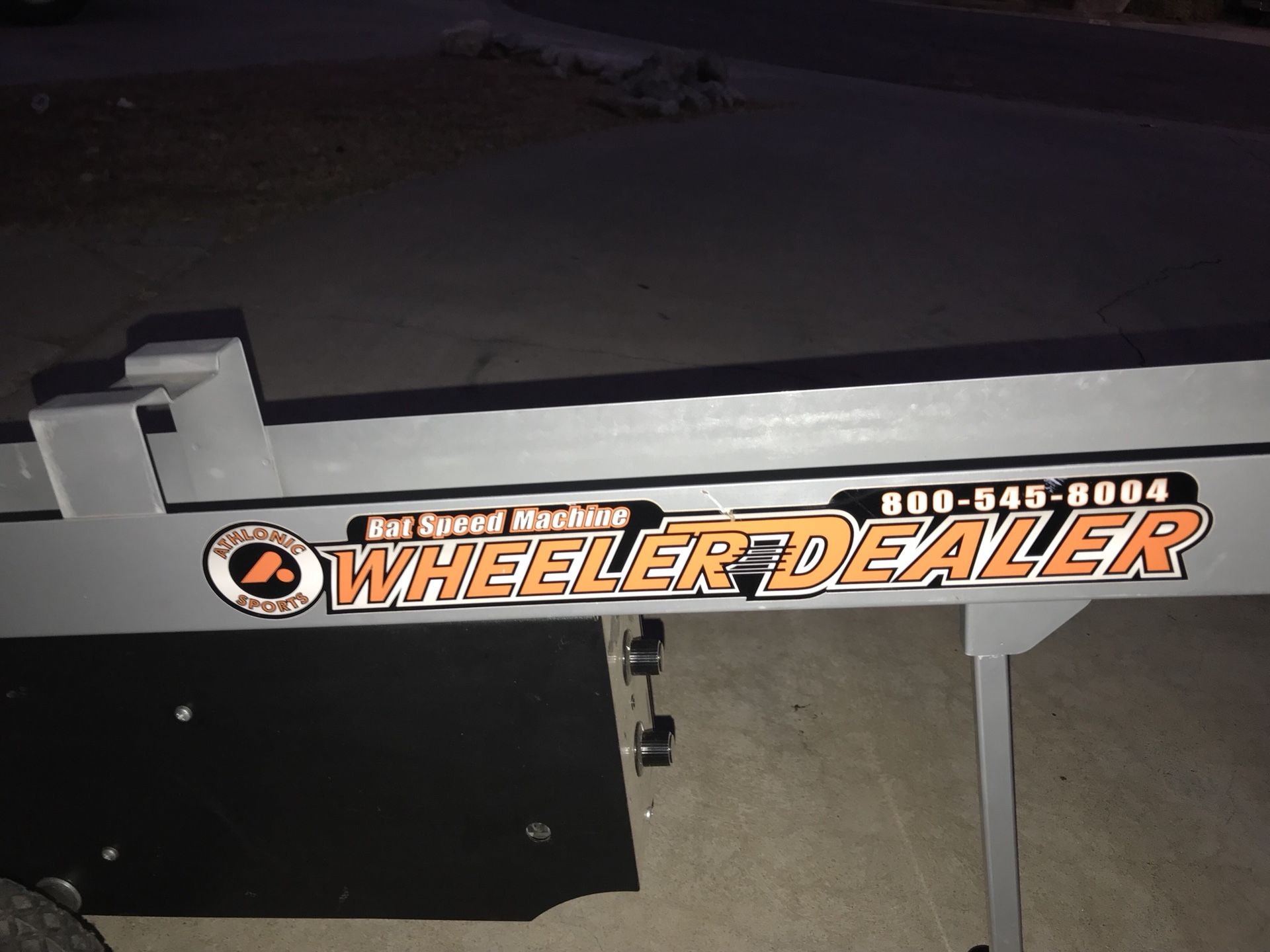 Wheeler dealer battery operated soft toss machine.$275 new is 399