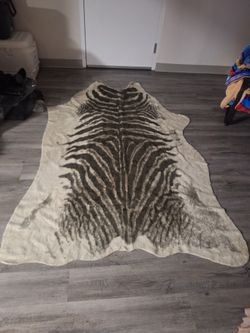 Zebra print area rug  5ft 3 inch x 7ft. 10 inch