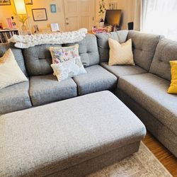 Living Spaces Arrowmask Charcoal Sectional + Storage Ottoman