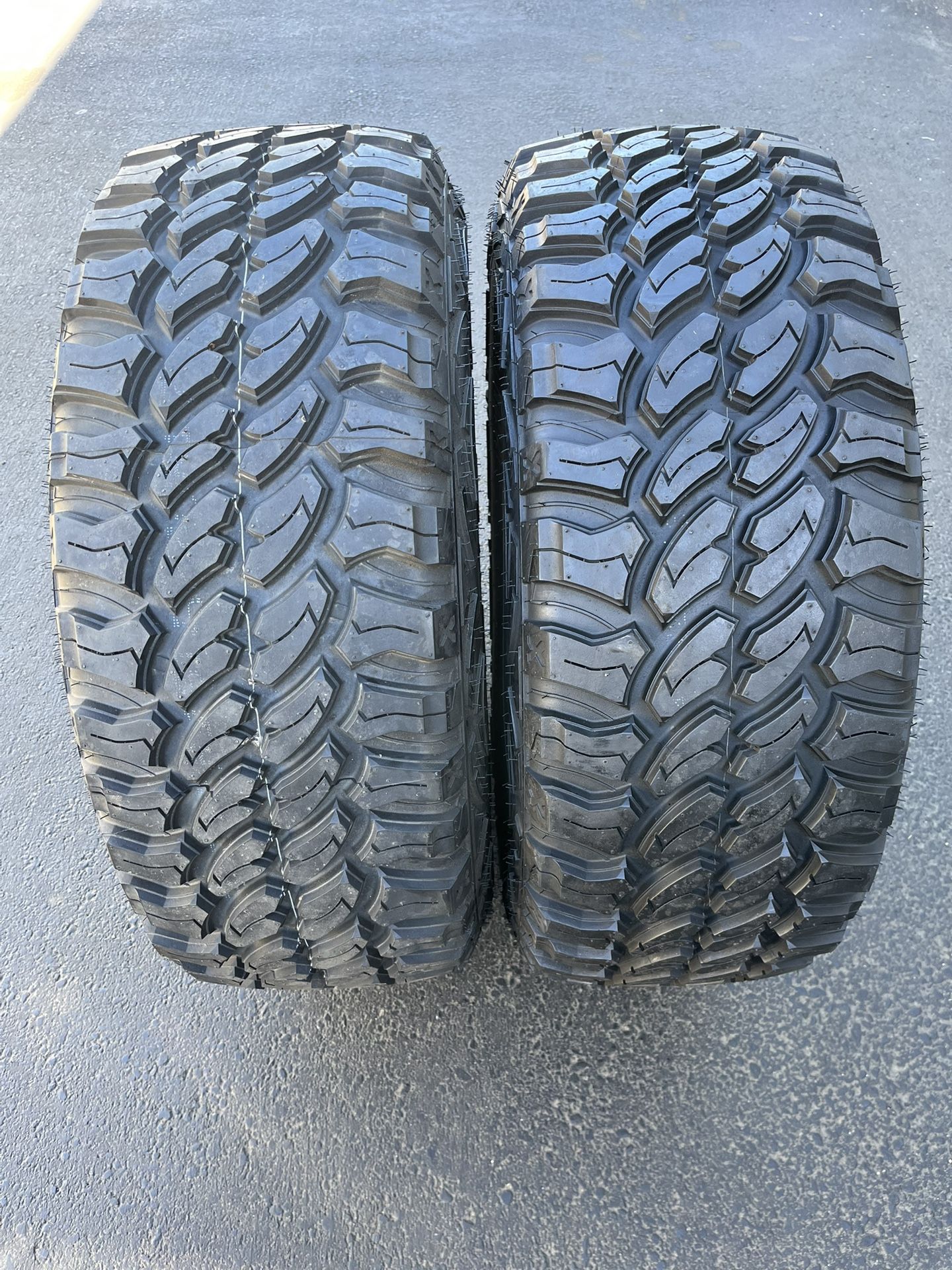 (2) 315/70R17 Pro Comp Mud Terrain 