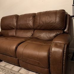 Power Reclining Brown Leather  Sofa And Loveseat