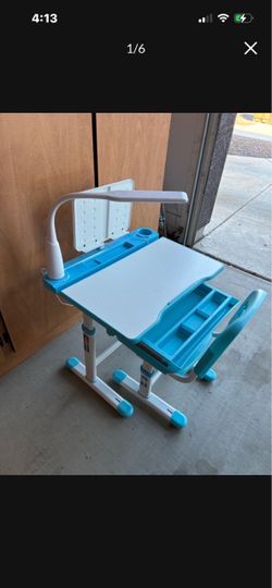 Child’s adjustable desk and chair