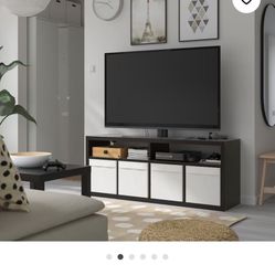 Selling lightly used IKEA tv center, black leather love seat, chair, and ottoman
