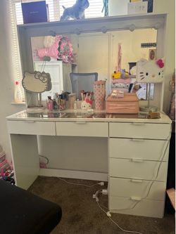 White vanity with added lights