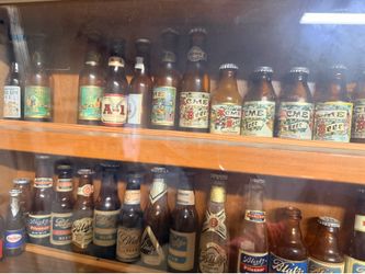 Collector Mini bottles in two cabinets