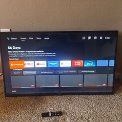 TCL 32” tv with wall mount and remote