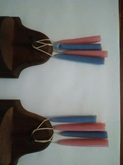 Wooden heart shaped candle holders with hanging candles
