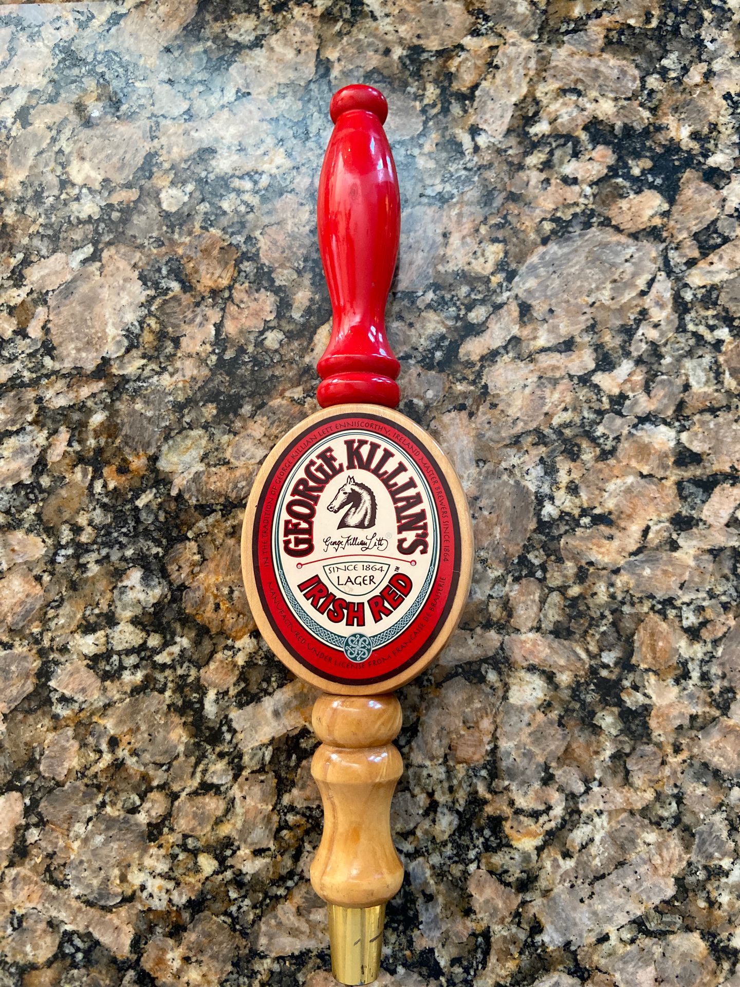 Killian’s red wooden beer tap