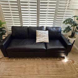 Living room couch w/ decor