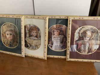 Beautiful doll pictures beautiful matted frames perfect condition adorn any little princesses room.