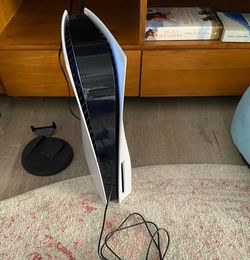 Like new ps5 disc version w controller and cords used for a month and half