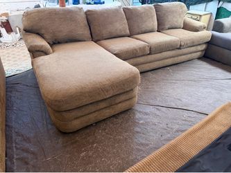 Brown L shape couch $200  $40 local delivery