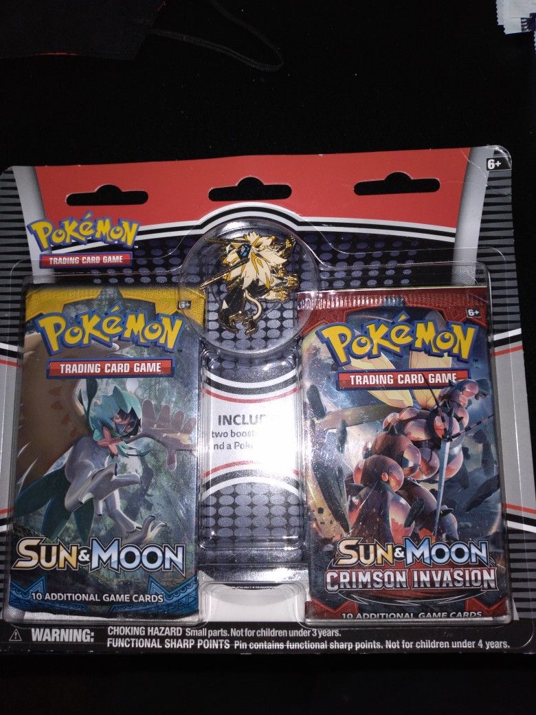 Pokemon Sun & Moon Booster W/ Pin