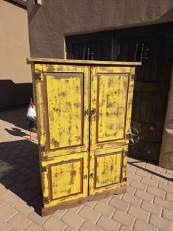 Rustic yellow cabinet