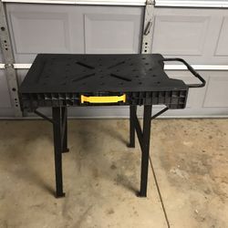 DeWalt plastic foldable work bench with metal legs