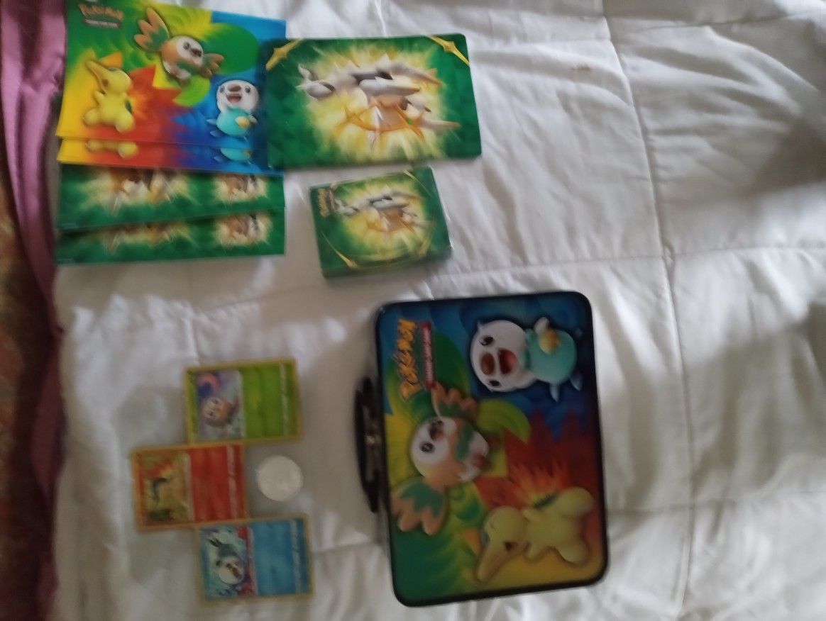 2 Sets Of Pokemon Tins With Cards & Collectible Coins