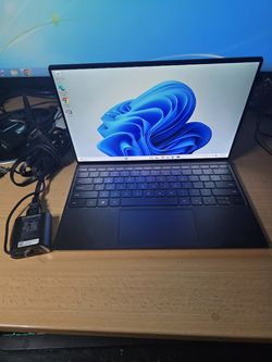 Dell XPS PC.  i7-1185G7-3.0GHz CPU 11Gen. 512GB SSD.  16GB Ram Wi-Fi Wireless Bluetooth .