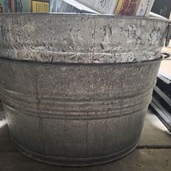 2 metal wash tubs