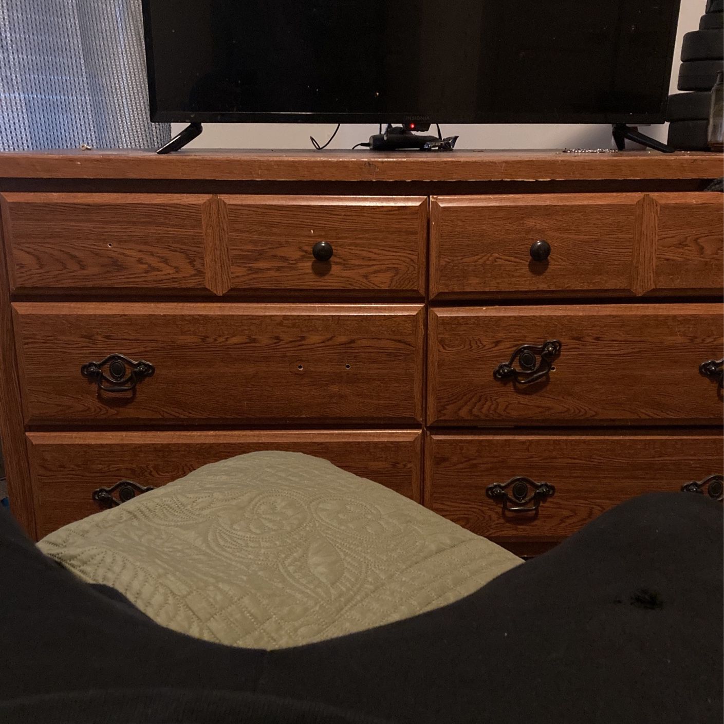 Television With A Firestick And A Dresser