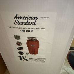 New American Standard Red 1 1/4 HP Premium Hush-Tek Garbage Disposer (Model #ASD-3125-HT).  