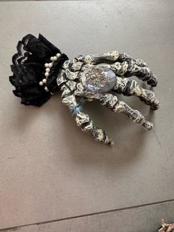 One of a Kind Hand Made Skeletal Hands by  Dragon Heart Gypsy.  I call this one Audrey Hepburn