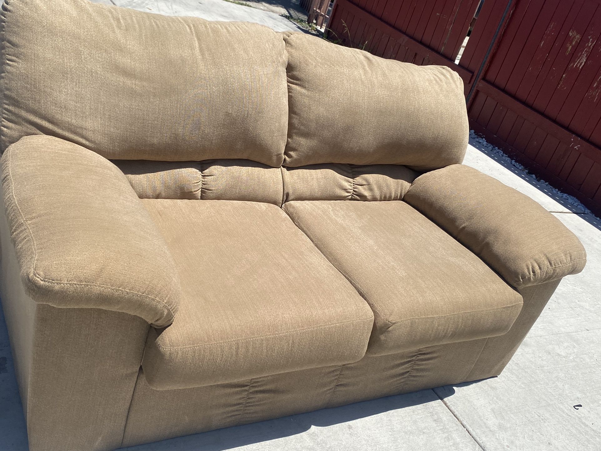 Ashley’s furniture Love seat couch sofa 2 seater Light Brown Great condition