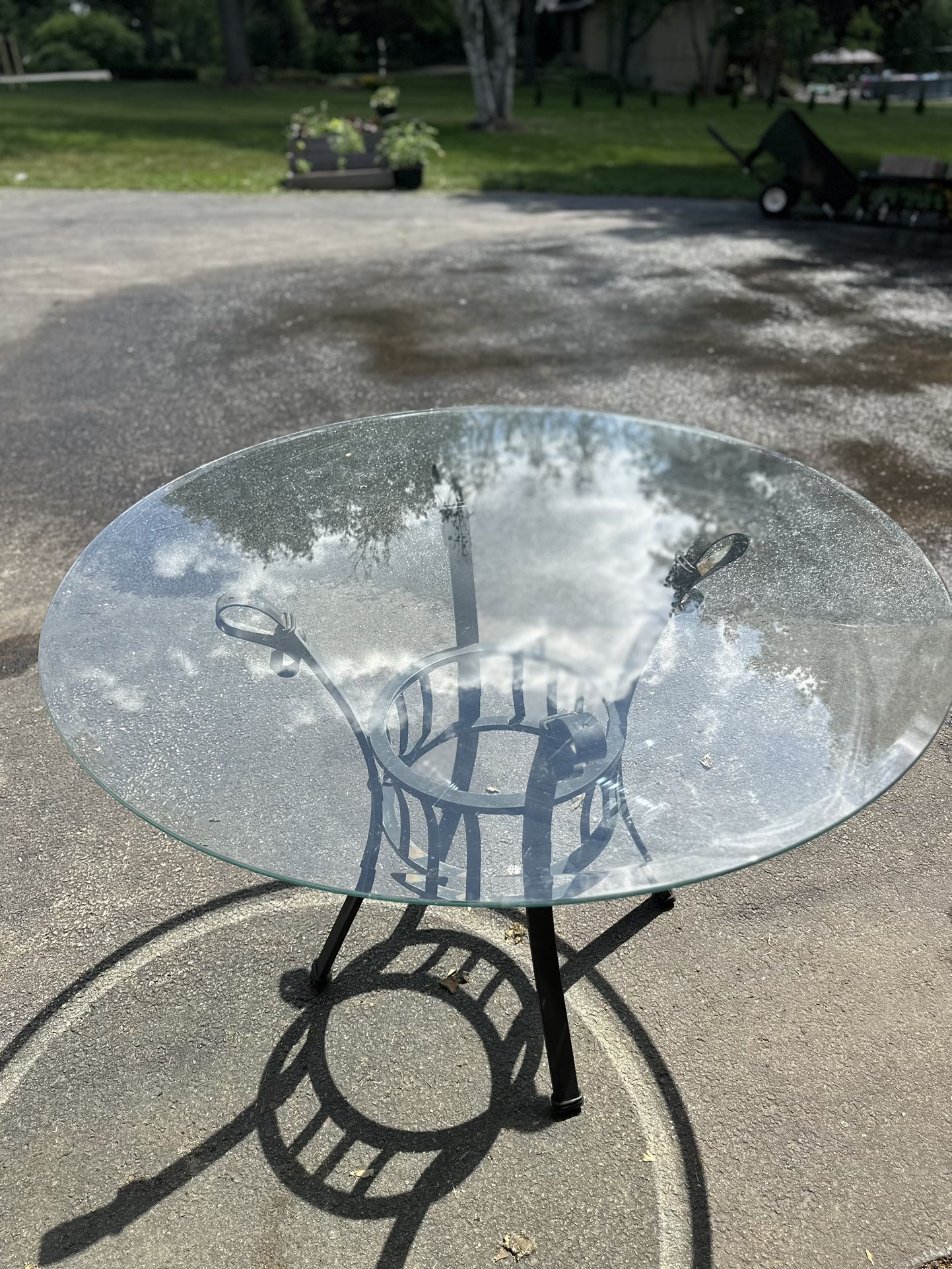 Glass top outdoor patio table