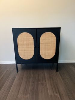 Black Cabinet with Cane Door Panels