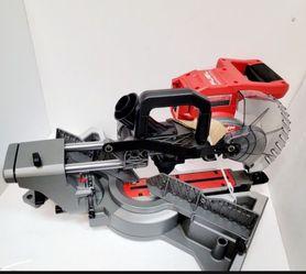 Milwaukee FUEL Brushless miter saw. This powerful saw is still in its original packaging, ready for any project. Has a red and grey finish.