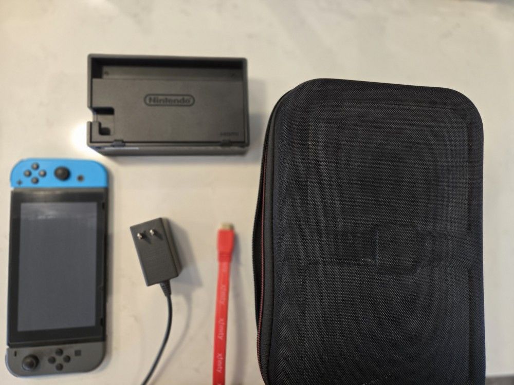 Nintendo Switch Console with Dock, Charger, and Case