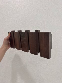 Wall mounted wooden coat rack