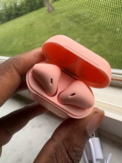 Pink earbuds