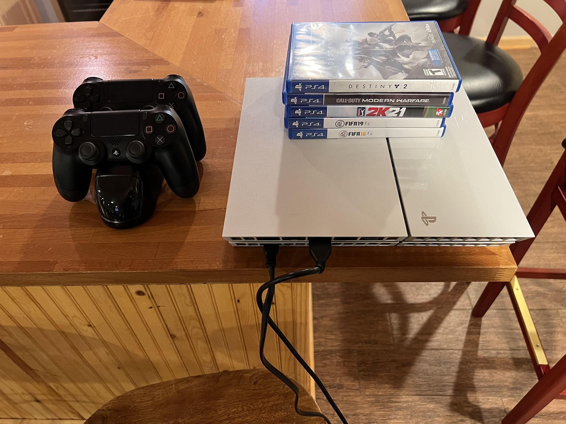 PlayStation 4 (PS4) Including 2 Controllers, Dual Controller Charging Station, Assorted Games  