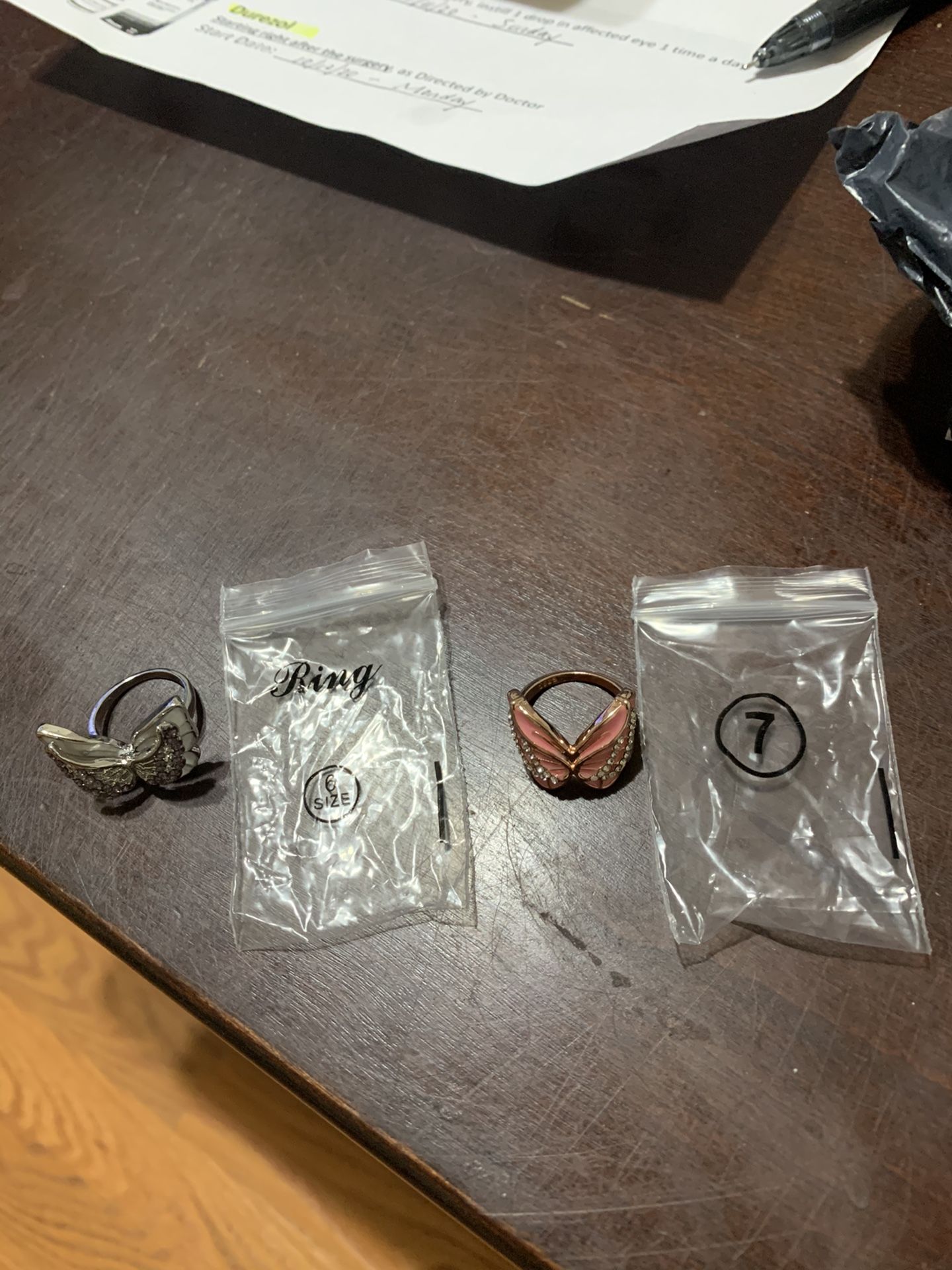 5.00 Each. 10.00 Both. Silver Butterfly Ring. Size 6. Pink Butterfly Ring size 7. Both Brand New.