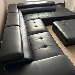 Black leather Sectional Sofá