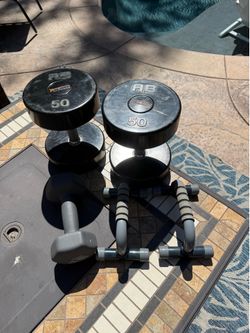 Pair of 50 LB Dumbbells, 15 LB Dumbbell, and Calisthenics Bars