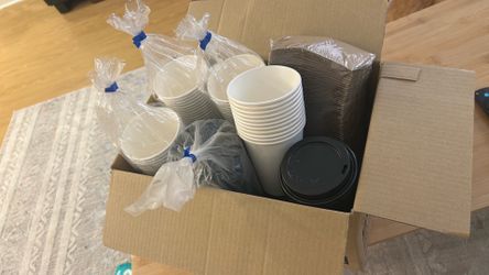 Disposable paper cups lids sleeves
