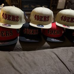 49ERS WITH GOLD BLOODED EMBLEM HATS 