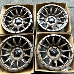 BRAND NEW! 20” wheels 6x135 bronze