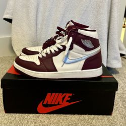 Air Jordan 1 High Bordeaux, size 10. Worn once, comes with original packaging. StockX verified for authenticity.