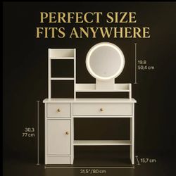 Vanity with mirror and lights + pink bow chair