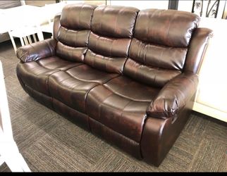 Reclining leather sofa and love seat